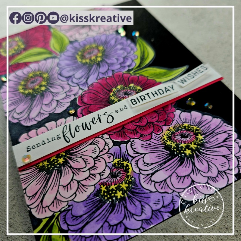 Using masks to create a one layer of flowers on a card
